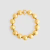 Hammered sphere necklace in gold-plated brass