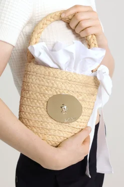 Iconic bucket bag in raffia