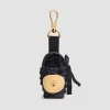 Iconic bucket charm in raffia