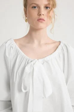 Ruffle hem dress in recycled faille